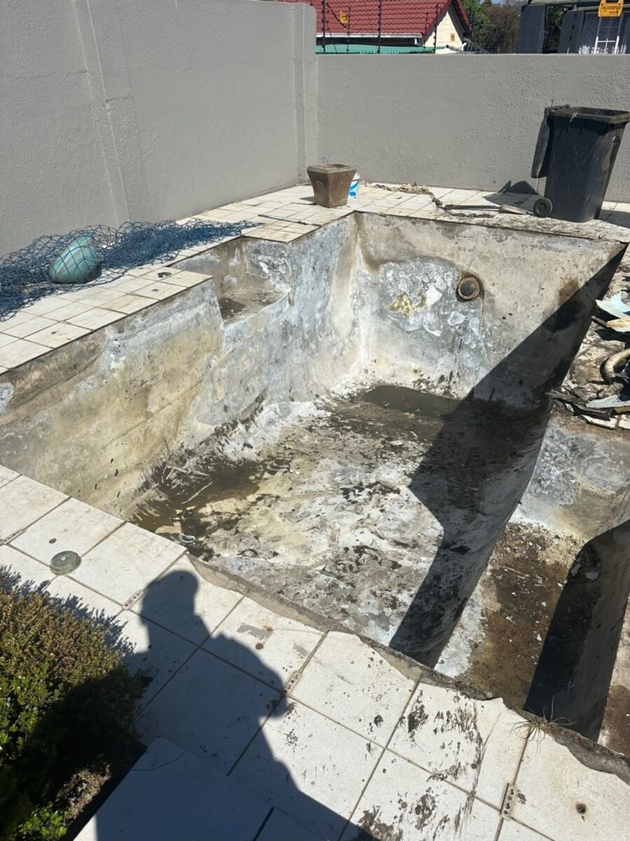 Damaged swimming pool shell before renovation, Randburg